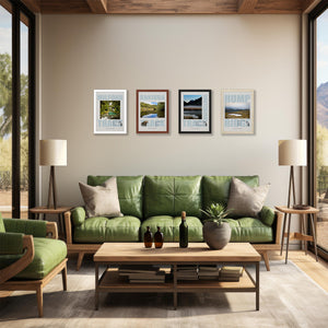 An example of Blankwallnz Great Walks posters - framed wall above the couch. 