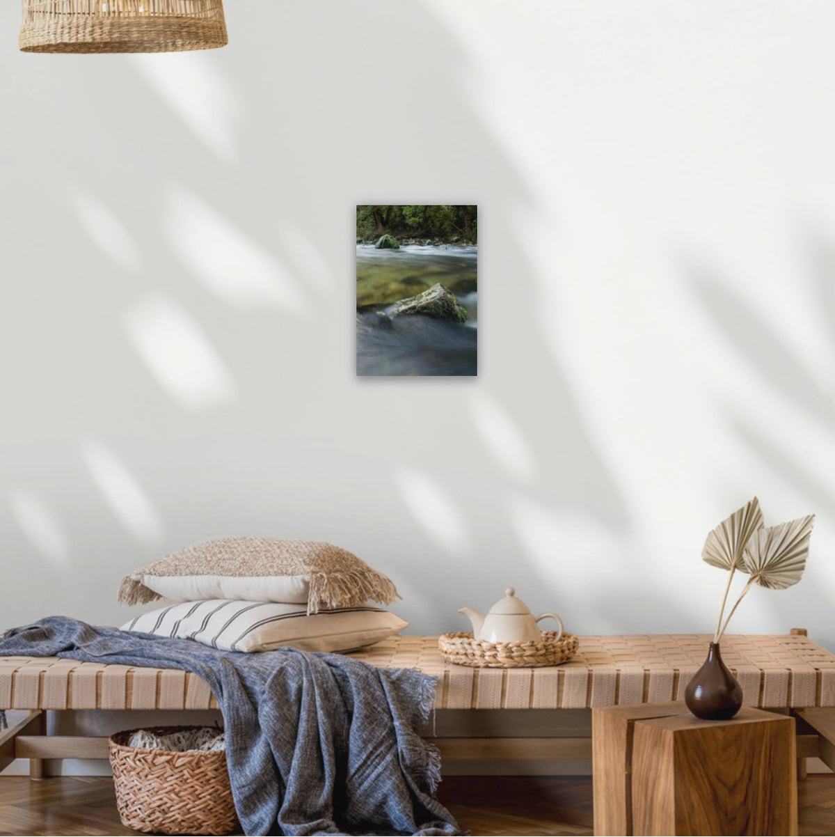 A small vertical wall art stretched canvas of a green forest and moody long exposure  clean river in New Zealand