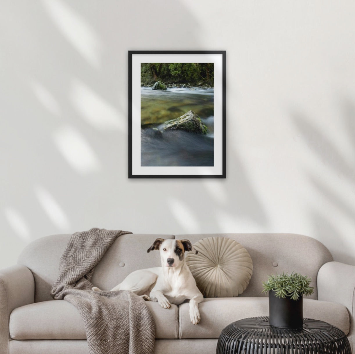 Milford Track, river rocks in the clear wilderness waters of a moody Clinton River, Fiordland, New Zealand.