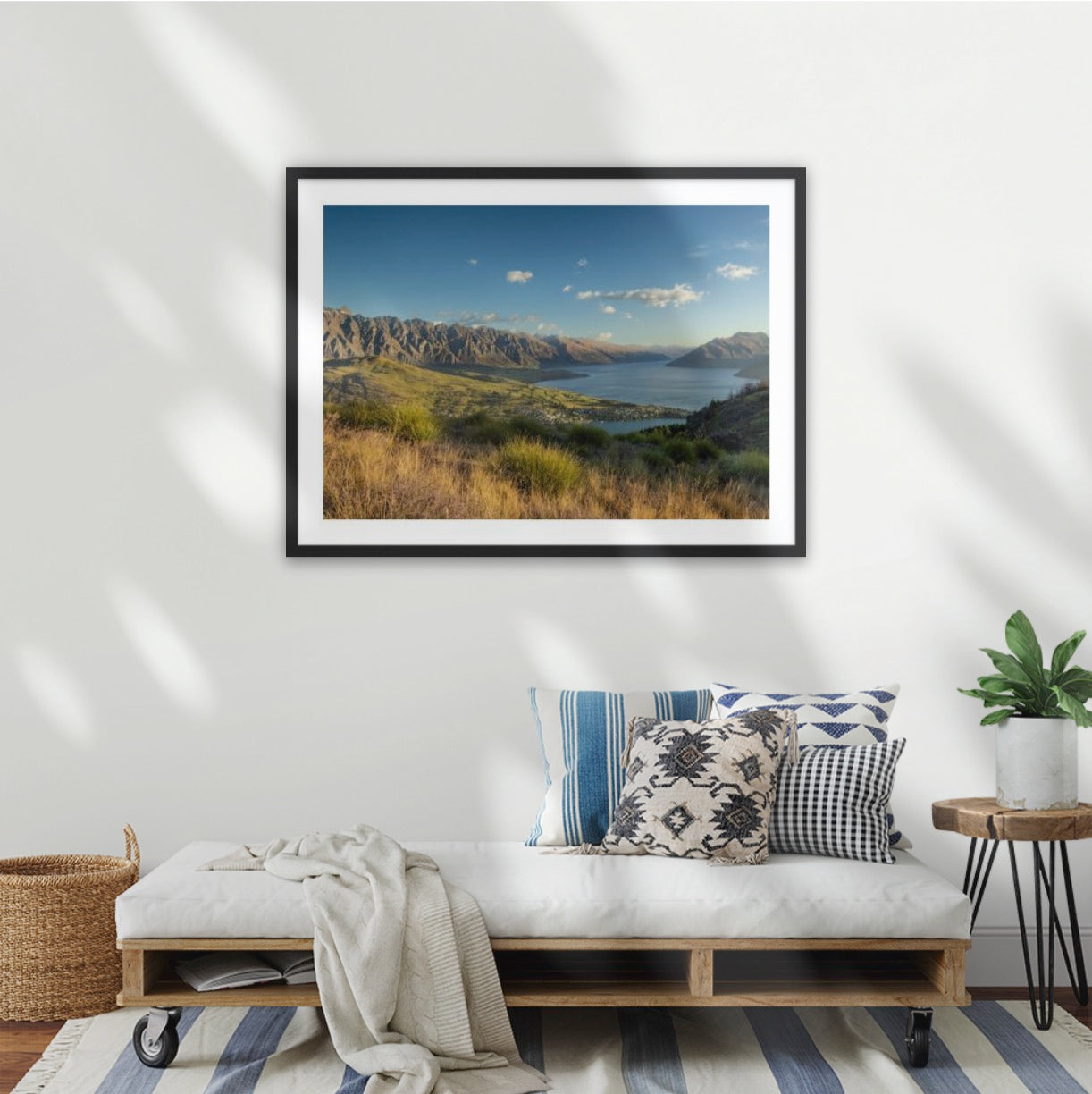 Sweeping sunset views of Queenstown's Remarkables mountain range in late spring, overlooking Lake Wakatipu, New Zealand