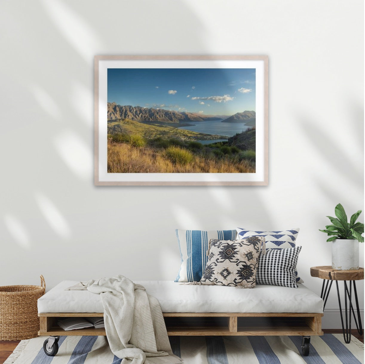 Sweeping sunset views of Queenstown's Remarkables mountain range in late spring, overlooking Lake Wakatipu, New Zealand