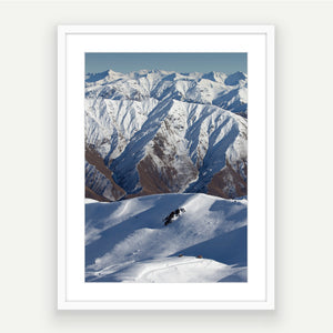 Ski scene of pillowy snow and southern alps mountains in the background, Cardrona, Wanaka New Zealand