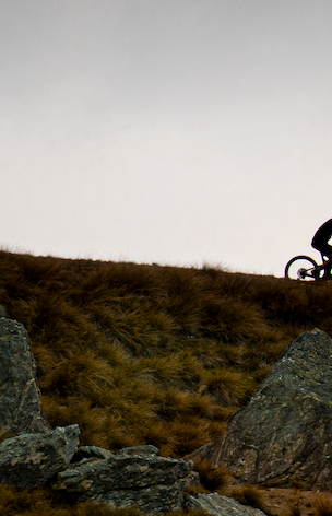 Float Frame Canvas - A3 size - Silhouette of a cyclist on a mountain trail against a gray sky