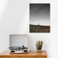 Sideboard with a canvas photograph of a mountain biker on a hillside in the background.