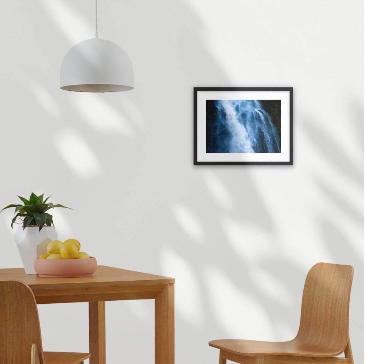 The Blue Waterbird celebrating the ethereal swirling waters of the Stirling Falls, Milford Sound in Aotearoa, New Zealand. A3 black wood frame (420 x 297mm print; 550× 420mm frame)