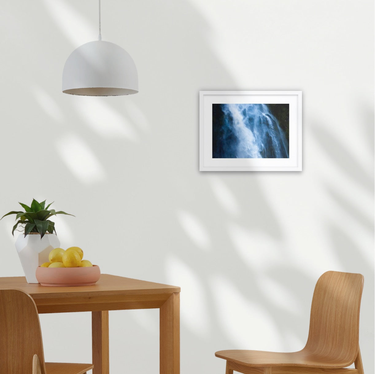 The Blue Waterbird celebrating the ethereal swirling waters of the Stirling Falls, Milford Sound in Aotearoa, New Zealand. A3 white wood frame (420 x 297mm print; 550× 420mm frame)