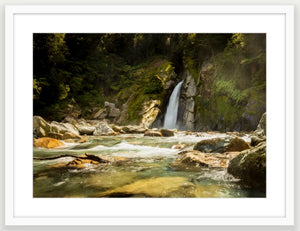 Thunderous Giants Gate falls on Milford Track, Fiordland National Park. Pristine wilderness river in toffee tones. Available up to size A2.